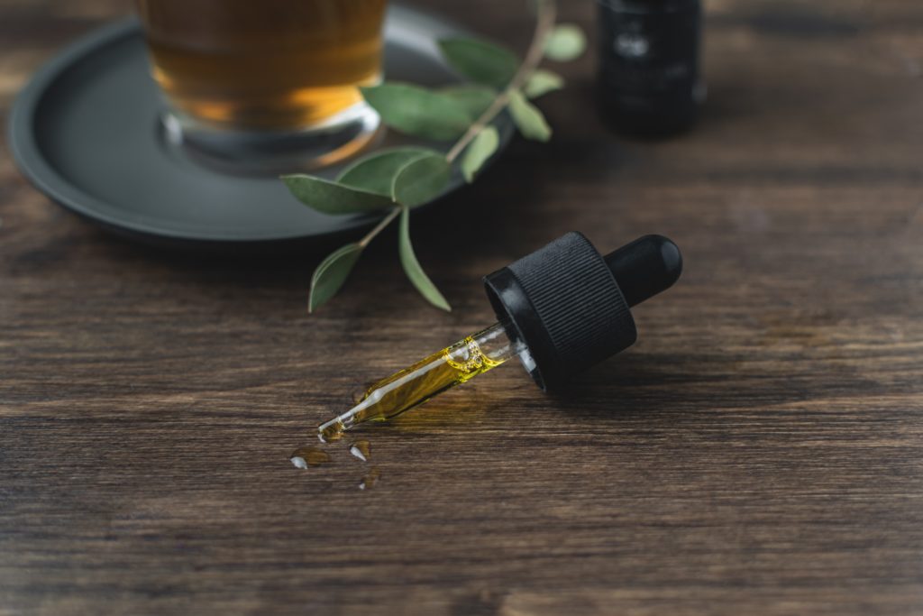 A CBD tincture dropper