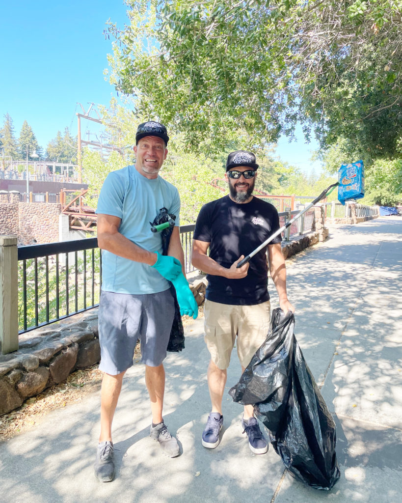 Charlie Woods and Damon Crain, two of the co-owners of Doobie Nights, on a Creek Cleanup with Elyon.